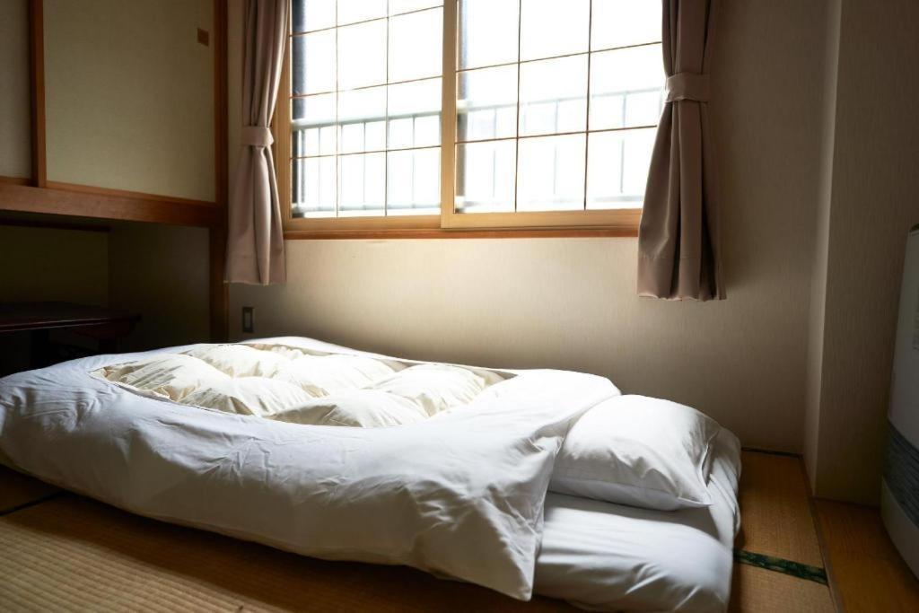 Sounkyo Onsen Kumoi Hotel Kamikawa  Buitenkant foto